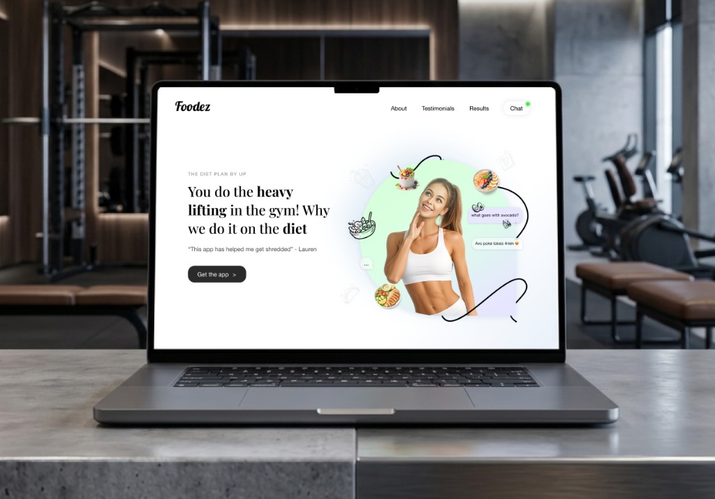 Foodez diet planner app and site shown on a laptop in a gym